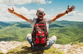 A person's feet firmly planted on a yoga mat during a standing pose.